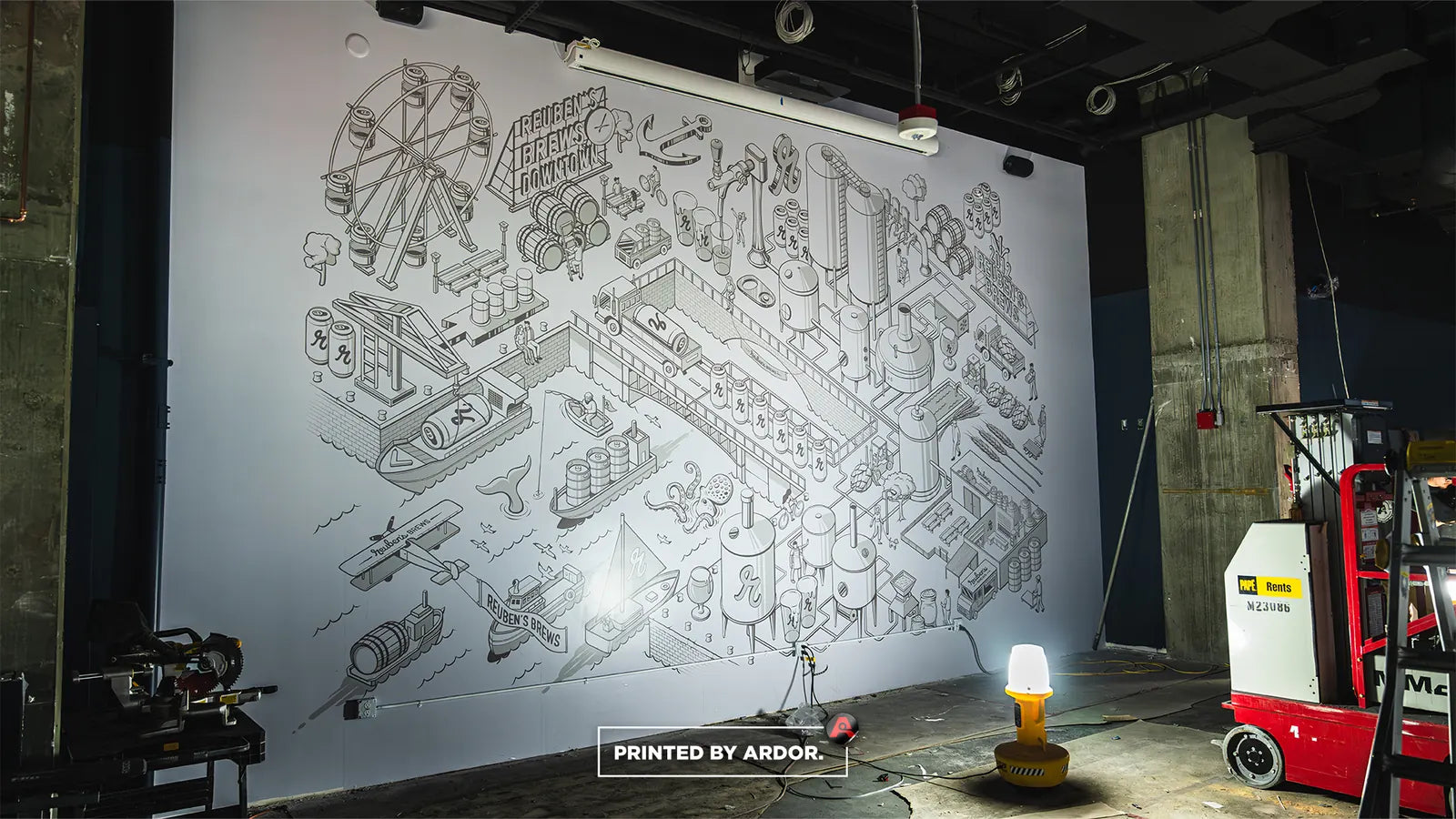 Large white wall mural with a detailed isometric line drawing of a brewery, Ferris wheel and equipment, shown during installation